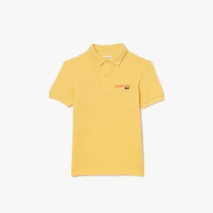 Jongens Lacoste Juniors Bedrukt Piqué Poloshirt in Geel