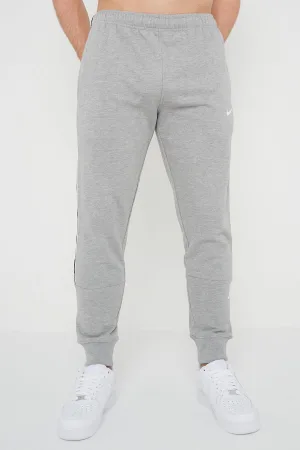 Nike Mens Repeat Taping Logo Fleece Cuffed Joggers in grijs