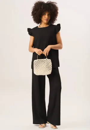 Oversized top met ruches en mouwen