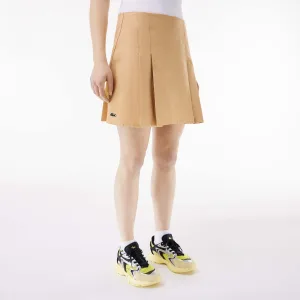 Dames Lacoste korte geplooide katoenen rok in beige