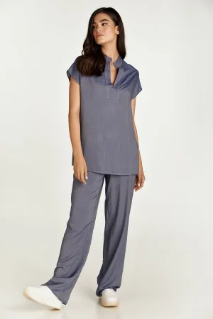 Blauwe mouwloze top in denimstijl