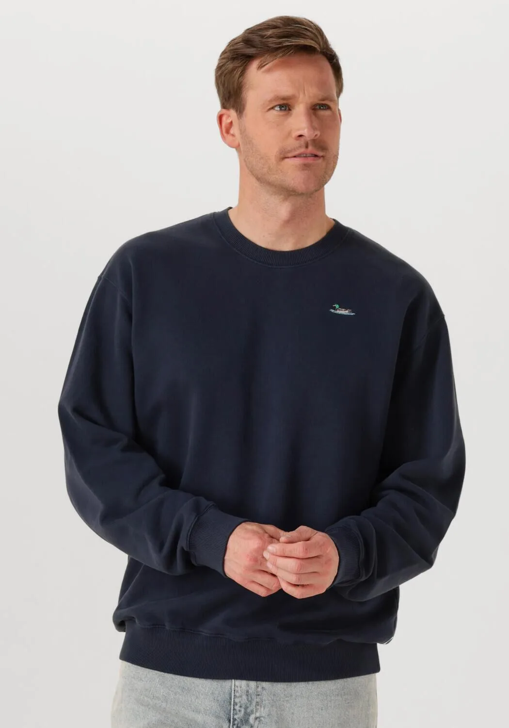 Je zoekt op: donkerblauwe sweater