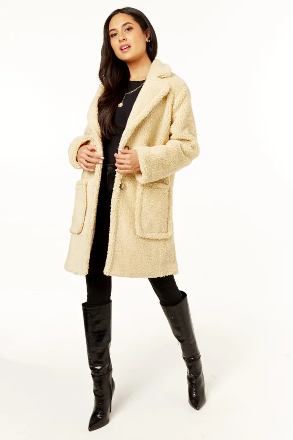 Lange teddy-overjas van imitatiebont