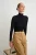 TRENDYOLMİLLA Dames Zwart Effen Lang Getailleerd Blouses