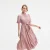 Thee -jurk met gelaagde ruches