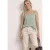 Top met V-hals en knoopdetail