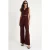 V-hals Wijde Pijpen Jumpsuit met Strikdetail