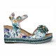 Laura Vita Facyo 75 damessandalen met sleehak, gemaakt van blauw leer met bloemenprint.