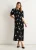 Zwarte midi-jurk met 3/4 mouwen en paisleyprint