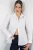 Oversized gestreepte blouse met knopen