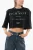 Cropped GENYA T-shirt met oversized pasvorm in zwart