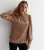 Loosefit blouse met hoge hals en pailletten