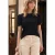 Shirt met ronde hals en knoopdetail