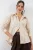 Oversized gestreepte blouse met knopen