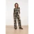 Smashed Lemon Jumpsuit met een abstracte print in zwart en beige |