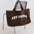 Aim’n katoenen tas met logo – donkerbruin