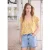 Blouse met hangende schouder en linten