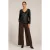 Elegante top met V-hals van imitatieleer