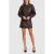 NIKKIE imitatieleren mini rok – donkerbruin