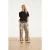 Smashed Lemon Crème wide leg broek met zwart grafisch patroon |