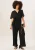 Geplooide jumpsuit met riem en overslag met hoekige mouwen