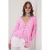Lichte V-hals gebreide top met knoopdetails