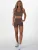 Divina Sportbroek ‘Nani’  chocoladebruin / wit