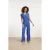Smashed Lemon Blauwe jumpsuit met overslag v-hals en tailleceintuur |