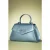 Dance the night away handtas in metallic blauw