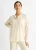 Beige getextureerd oversized shirt met lange mouwen