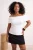 Trendyol Curve Dames Ecru Effen Mouwloos Getailleerd Grote maten Blouses