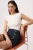 TRENDYOLMİLLA Dames Ecru Effen Mouwloos Getailleerd Blouses