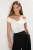 TRENDYOLMİLLA Dames Ecru Effen Mouwloos Getailleerd Blouses
