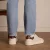 Manfield leren sneakers ecru