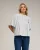 Gestreepte blouse met honingraatborduursel.