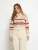 Peppercorn Gebreid vest ‘Malla’  lichtbeige / rood
