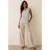 Gedrapeerde mouwloze jersey top met V-hals