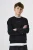 Zwarte sweater
