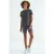 Dames relaxte t-shirt met ronde hals en zijopeningen