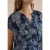 Blouse met split in de hals en een mix van texturen