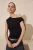 TRENDYOLMİLLA Dames Zwart Effen Mouwloos Getailleerd Blouses