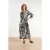 Smashed Lemon Zwart-witte blousejurk met tropische print |