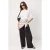TRENDYOLMİLLA Dames Ecru Effen Kort Regular fit T-shirts