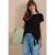 Blouse met ronde hals en knoopdetail