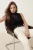 TRENDYOLMİLLA Dames Zwart Effen Mouwloos Getailleerd Blouses