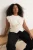 Trendyol Curve Dames Ecru Effen Mouwloos Getailleerd Grote maten Blouses