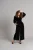 Ava jumpsuit van fluweel – Zwart