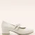 Delphine Softline Vegan lak pumps in ivoorwit