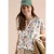 Shirt met gespleten hals en knoopdetails