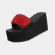 Rode koraalkleurige teenslipper zwart
